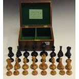 A late 19th/early 20th Century boxwood and ebony Staunton chess set by Jaques and Son, London, the