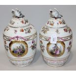 A pair of Dresden porcelain jars and covers, late 19th Century, each domed cover with eagle surmount
