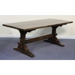 A late 20th Century oak refectory table, the rectangular top above block supports and bracket