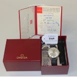 An Omega Automatic stainless steel cased gentleman's wristwatch, the signed silvered dial with