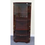 A modern corner display cabinet by Turnidge of London, height approx 170cm, width approx 77cm.