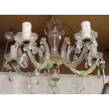 A 20th Century moulded glass five branch ceiling light, hung with lozenge drops, height approx 36cm,