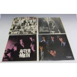 A mono first pressing of 'Aftermath' by The Rolling Stones, together with three other LP records