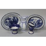 A pearlware pottery oval plate or stand, early 19th Century, printed in underglaze blue with a