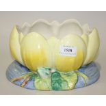 A Clarice Cliff waterlily bowl, the naturalistic base with moulded leaf and bud decoration,