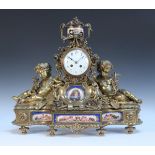 A mid-19th Century French ormolu and Sèvres style porcelain mantel clock with eight day movement