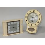 An Art Deco cream Bakelite cased drop dial wall timepiece, the dial inscribed 'Smiths Enfield',