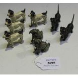 A group of eight late 19th Century cold painted lead figures of dogs, comprising two pugs, length
