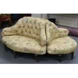 A late Victorian four-piece interlocking conversation settee upholstered in a floral patterned