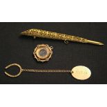 A gold mounted compass pendant fob with a beaded border, detailed '9ct', a gold key fob chain, one