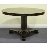 A Regency rosewood tip-top breakfast table, the circular top above a triform section stem, raised on