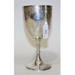 A Victorian silver goblet, the ovoid bowl engraved with swags and floral garlands, London 1874 by