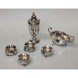 A set of four late Victorian silver circular salts, each of tapering form on ball feet, Sheffield