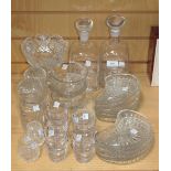 A pair of Dartington clear glass decanters and stoppers of square shouldered form, together with a