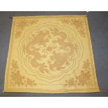 A Chinese silk embroidered yellow wall hanging, late Qing dynasty, worked with a design of