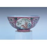 A Chinese famille rose pink ground porcelain bowl, mark and period of Daoguang, the exterior painted