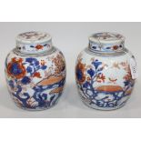 A pair of Chinese Imari porcelain ginger jars and covers, 18th Century, each ovoid body painted