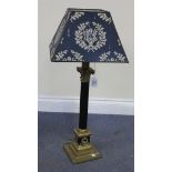 A modern gilt brass and black painted Corinthian column table lamp, on a stepped square base, height