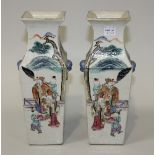 A pair of Chinese famille rose porcelain vases, mid-19th Century, each of square baluster form,