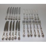 A Norwegian .830 silver part canteen of cutlery by Marthinsen, with shaped handles and foliate