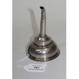 A George III silver wine funnel, the circular bowl with removable beaded rim and detachable spout,