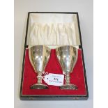 A pair of silver goblets each with a knop stem and circular stepped foot, Birmingham 1973, height