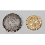 A Victoria Young Head shield back sovereign 1872, and a Victoria 'Godless' florin 1849.