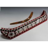 A mid-20th Century carved and painted wood ethnic model of a boat, length approx 77cm, together with