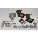A collection of British coins, comprising a George IV crown 1821, six further crowns, comprising