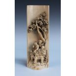 A Chinese ivory tusk carving, early Republic period, finely carved in high relief with a scene of