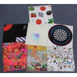 A collection of LP records and singles, including albums by Cream, Curved Air, Led Zeppelin,