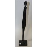 A blackware figure of an hermaphrodite, second half 20th Century, in the style of Giacometti, of