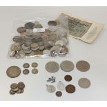 A quantity of British and foreign coins, including a George V Silver Jubilee crown 1935, three