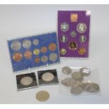 A collection of coins, including a Victoria Jubilee Head double florin 1887, a USA Morgan dollar