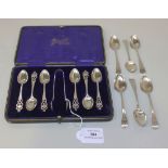 A set of six George V silver coffee spoons and pair of matching sugar tongs with pierced and