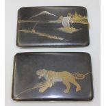 Two Japanese Komai style damascened iron cigarette cases, early 20th Century, of curved