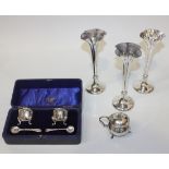 A set of three Edwardian silver specimen vases, on knop stems and circular bases, London 1902 by