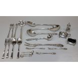 A silver three piece condiment set with wavy rims, comprising salt, mustard and pepper caster,