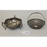An Edwardian silver bonbon dish, of lobed form with cast scroll handles, Chester 1909 by Jay,