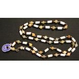 A banded agate cylindrical and spherical bead necklace, length approx 90cm.