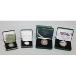 A collection of Elizabeth II commemorative proof coinage, comprising a five pounds crown