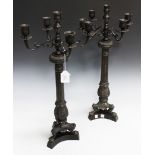 A pair of late 20th Century Regency style patinated cast bronze five light candelabra with fluted