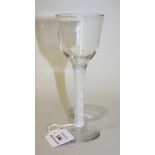 A double series opaque twist stem wine glass, circa 1770, the ogee bowl raised on a plain stem