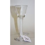 A double series opaque twist stem wine glass, circa 1770, the rounded funnel bowl raised on a