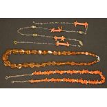 A treated and reconstituted translucent amber bead necklace, two necklaces incorporating branch