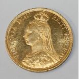 A Victoria Jubilee Head two pounds piece 1887 (with evidence of adhesive to the reverse).