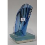A Kosta glass sculpture by Goran Warff, dated 1998, the clear and blue cased abstract fluid form