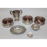 An Edwardian silver oval bonbon dish with pierced sides and foliate scroll rim, Sheffield 1904 by