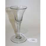 An airtwist stem wine glass, mid-18th Century, the gently bell shaped bowl raised on a plain stem