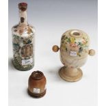 A Victorian decalcomania clear glass bottle, the interior with applied printed decoration and a